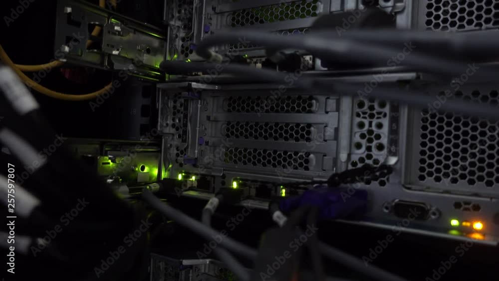 Poster back panel of powerful servers installed in the rack of the server room of the data center