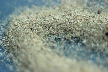 Gray sand surface with a cut line. Gray sand texture. Background sand. Seamless texture of sand.