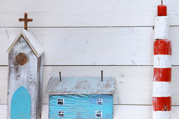 toy house, church  in miniature. View on top. background for invitations, posters the marine theme. wedding theme