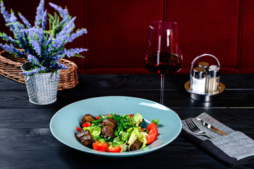 fresh salad with vegetables and grilled meat