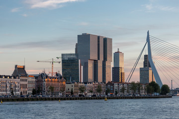 Obraz premium Rotterdam with modern buildings at golden hour sunset