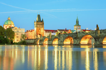 Scenic view Charles bridge and historical center of Prague, buildings and landmarks of old town at sunset, Prague, Czech Republic