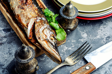 Pike stuffed with vegetables