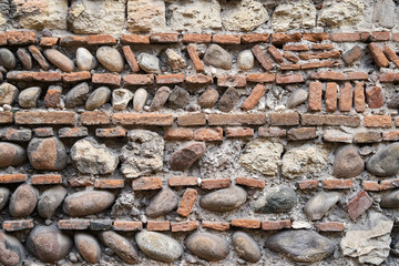 Old wall of stone and brick.