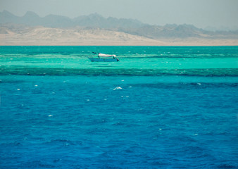 Sail boat ship with tourists in Ras Mohamed National Park in the Red Sea, Sharm El Sheikh, Egypt.