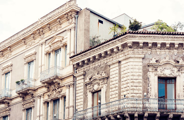 Beautiful cityscape of Italy, historical street of Catania, Sicily, facade of old buildings.