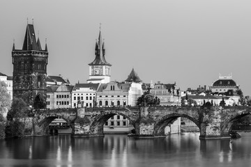 Scenic view Charles bridge and historical center of Prague, buildings and landmarks of old town at sunset, Prague, Czech Republic