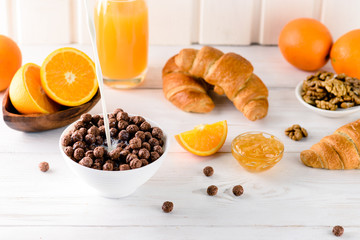 chocolate cereal with milk for breakfast, breakfast concept
