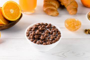 chocolate cereal with milk for breakfast, breakfast concept