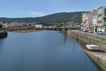 Bridge On The Traba River Before Flowing Into The Ria In Noya. Nature, Architecture, History, Street Photography. August 19, 2014. Noia, La Coruña, Galicia, Spain.