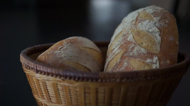 crusty sourdough bread in a wicker basket in 4k