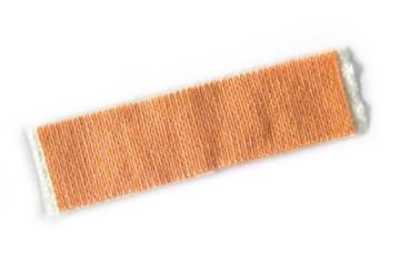 wound plaster isolated on white background. Medical patch aid strip.
