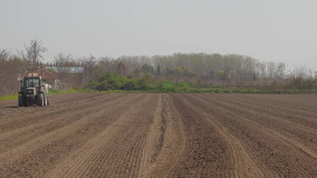 Farmer prepare his field to sow the seed