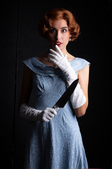 Glamorous 1930s woman in blue dress