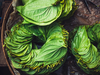 Betel leaf stack in Basket Top view Asian herb Food and medicine