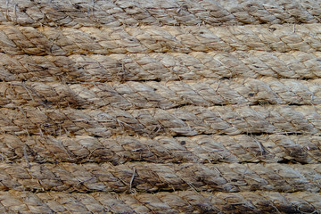 Texture detail closeup straight line of hemp rope in multiple rows