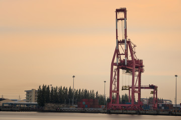 Fototapeta na wymiar Cargo Cranes in Industrial Port