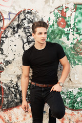 Young elegant man wearing black clothes