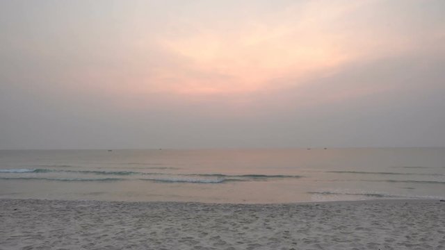 Amazing view of sea during sundown. Colorful sky with dense clouds.