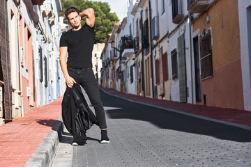 Handsome young man in black