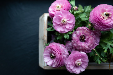 moody purple flowers in flower box, invitation card