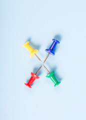 Colored pushpins, office supplies, close-up