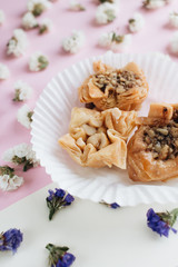 Baklava sweet dessert. Pastry made of layers of filo filled with chopped nuts and sweetened and...