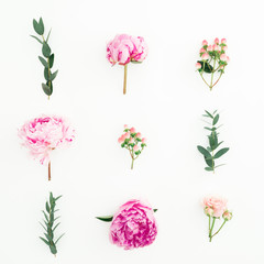 Floral composition with peonies, roses, hypericum and eucalyptus on white background. Flat lay, top view