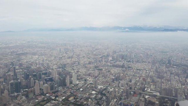Aerial view of the Taichung city cityscape form a window seat