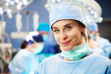 Portrait of smiling surgeon in operating room 