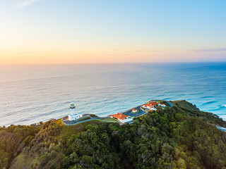 Byron Bay lighthouse at sunrise from an aerial view