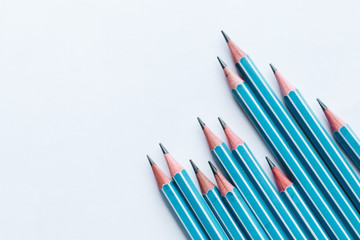 Composition of pencils on white background