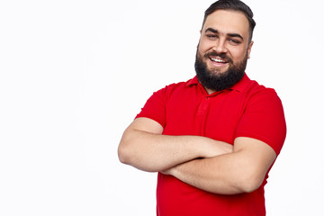 Positive ethnic guy with crossed arms