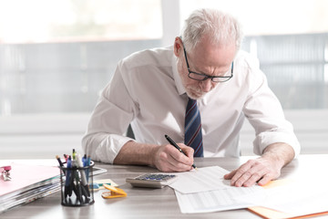 Businessman doing his accounting