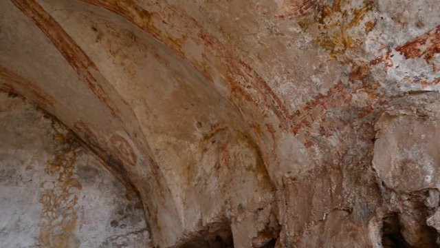 Apricena, Apulia, Italy - March 09 2019: ruins of Eremo of Sant'Agostino with traces of frescoes in the valley of the hermitages. Hermitages of Stignano in Gargano National Park