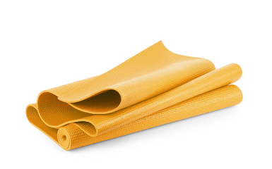 Orange color yoga matt on background