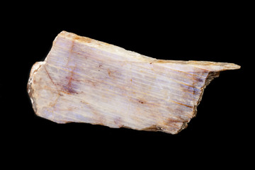 Macro of a stone mineral Moonstone on a black background