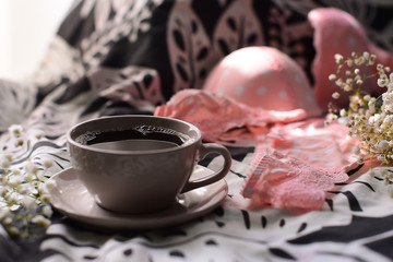 Flat lay, magazines, social media. Top view pink lace lingerie. Beauty blog concept. Woman fashion accessories, underwear, bouquet of roses and pions, parfume, jewelry, coffee on white bed background