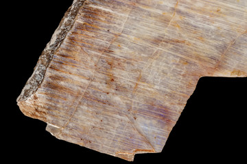 Macro of a stone mineral Moonstone on a black background