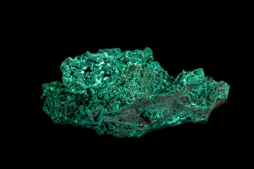 Obraz premium Macro of a mineral stone Malachite on a black background