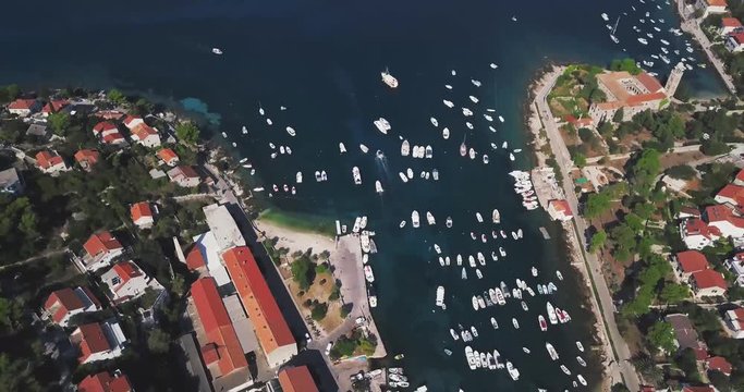 Tilt reveal of breathtaking Hvar island, aerial view on beautiful summer day