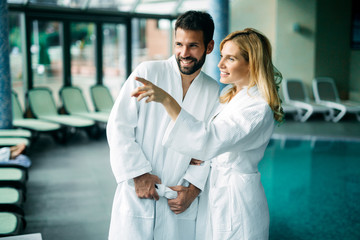 Portrait of attractive couple in spa center