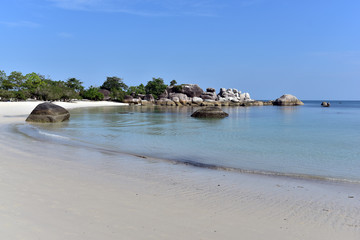 Tanjung Tinggi Beach is the most famous beach in Belitung Island with white sand and granite rocks, Indonesia