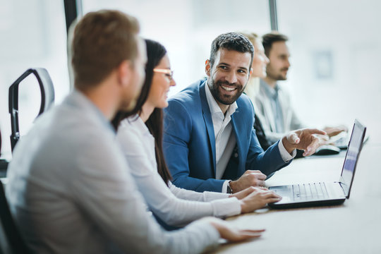 Picture of business people working together in office