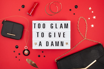 Lightbox with phrase Too glam to give a damn