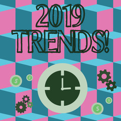 Writing note showing 2019 Trends. Business concept for general direction in which something is developing or changing Time Management Icons of Clock, Cog Wheel Gears and Dollar