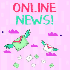 Writing note showing Online News. Business concept for newly received or noteworthy information about events website Colorful Airmail Letter Envelopes and Two of Them with Wings