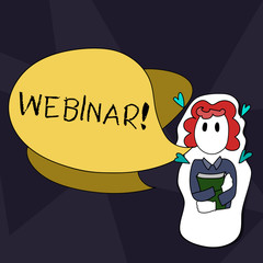 Handwriting text writing Webinar. Conceptual photo Internet distance learning web elearning Girl Holding Book with Small Hearts Around her and Two Color Speech Bubble