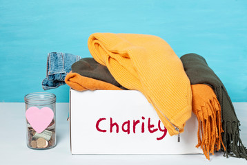Coins, banknotes in money jar and box with donations
