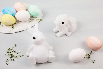 Easter composition with bunnies and eggs